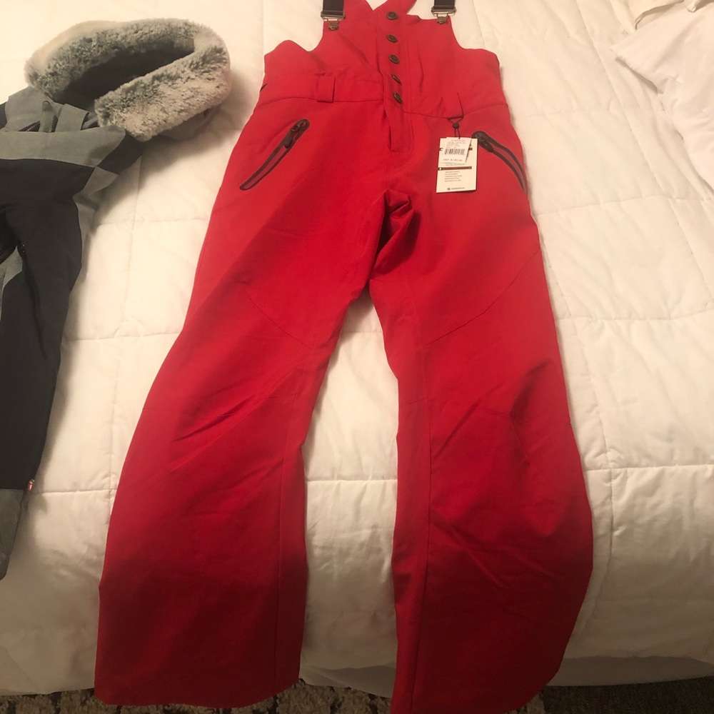 Up for sale is a super cute brand new ski jacket and ski bibs by Boulder Gear.